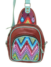 Load image into Gallery viewer, MoonLake Designs Blake Sling Over Backpack Bag in red brown (burnt sienna) handcrafted leather with fun geometric huipil design in blue, pink, purple, and green with teal leather adjustable strap and accents