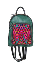 Load image into Gallery viewer, Petite small cute backpack purse in dark green leather and black leather straps and accents.. It has double zipper openings. Front pocket is eye catching with a geometrichot pink, purple, black and teal green textile. this pocket has storage for pens and credit cards. Main compartment has two open pockets and a zipper pocket.