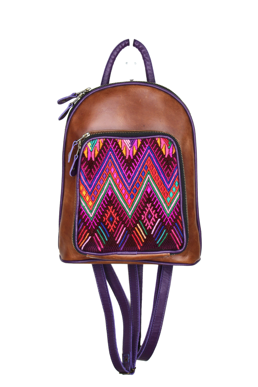 Petite small cute backpack purse in a medium tan leather and purple leather straps and accent. It has double zipper openings. Front pocket has storage for pens and credit cards. Main compartment has two open pockets and a zipper pocket.