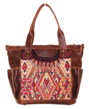 Load image into Gallery viewer, MoonLake Designs Elena medium convertible day bag in dark tan leather with mayan handwoven huipil in sunset colors