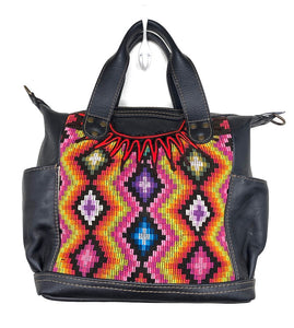 MoonLake Designs Elena Medium Convertible Day bag in black leather with beautiful handwoven traditional geometric huipil design in warm colors including pink, orange, purple, red, and yellow 