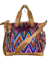 Load image into Gallery viewer, MoonLake Designs handmade Gabriella Large Convertible Day Bag in Light Tan Leather with textile pocket and multi-color handwoven huipil designs including pinks blue and orange with removable and adjustable crossbody strap and drop handles