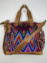Load image into Gallery viewer, MoonLake Designs handmade Gabriella Large Convertible Day Bag in Light Tan Leather with textile pocket and multi-color handwoven huipil designs including pinks blue and orange with removable and adjustable crossbody strap and drop handles