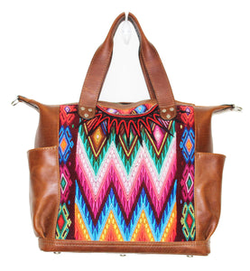 MoonLake Designs Gabriella large convertible day bag in medium tan leather with eye catching geometric handwoven huipil in vibrant green, blue, pink, orange, and yellow