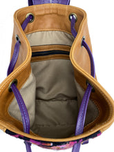 Load image into Gallery viewer, MoonLake Designs Maya bucket backpack inside view of pear leather, cream clothe interior, and zippered pocket