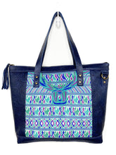 Load image into Gallery viewer, MoonLake Designs Olivia Large Tote Bag in textured navy blue handcrafted leather with mesmerizing handwoven huipil design in shades of blue, teal, and purple and leather tassel zipper closure