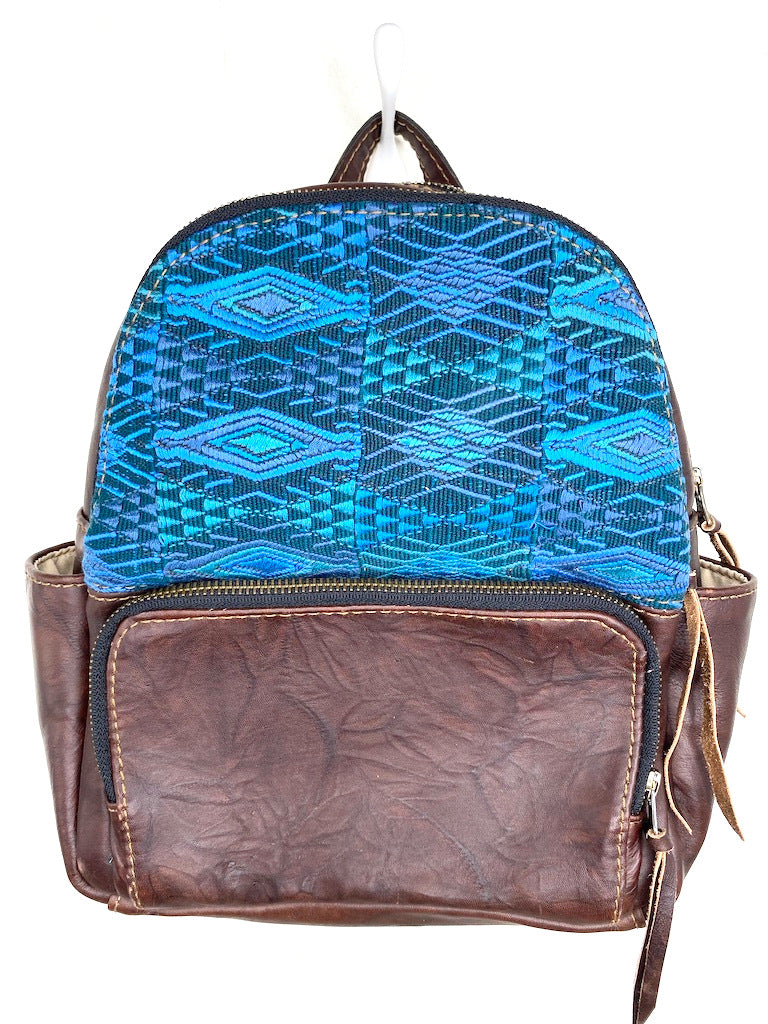 MoonLake Designs handmade Paloma small backpack in Textured Dark Chocolate Leather with eye catching handwoven blue huipil design covering front top
