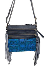 Load image into Gallery viewer, MoonLake Designs Penelope Flecos crossbody bag with fringe in black leather, 3 zipper compartments, and geometric blue huipil design