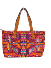Load image into Gallery viewer, MoonLake Designs Small over the shoulder tote in brown leather with full textile huipil front in geometric desert colors with a full cloth back