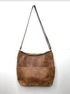 MoonLake Designs Rosa Crossbody full light tan leather back view and full length open leather pocket