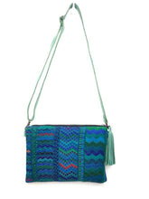 Load image into Gallery viewer, MoonLake Designs Lola small bag and clutch in teal leather with handwoven textile featuring different shades of blue and teal with teal leather tassel